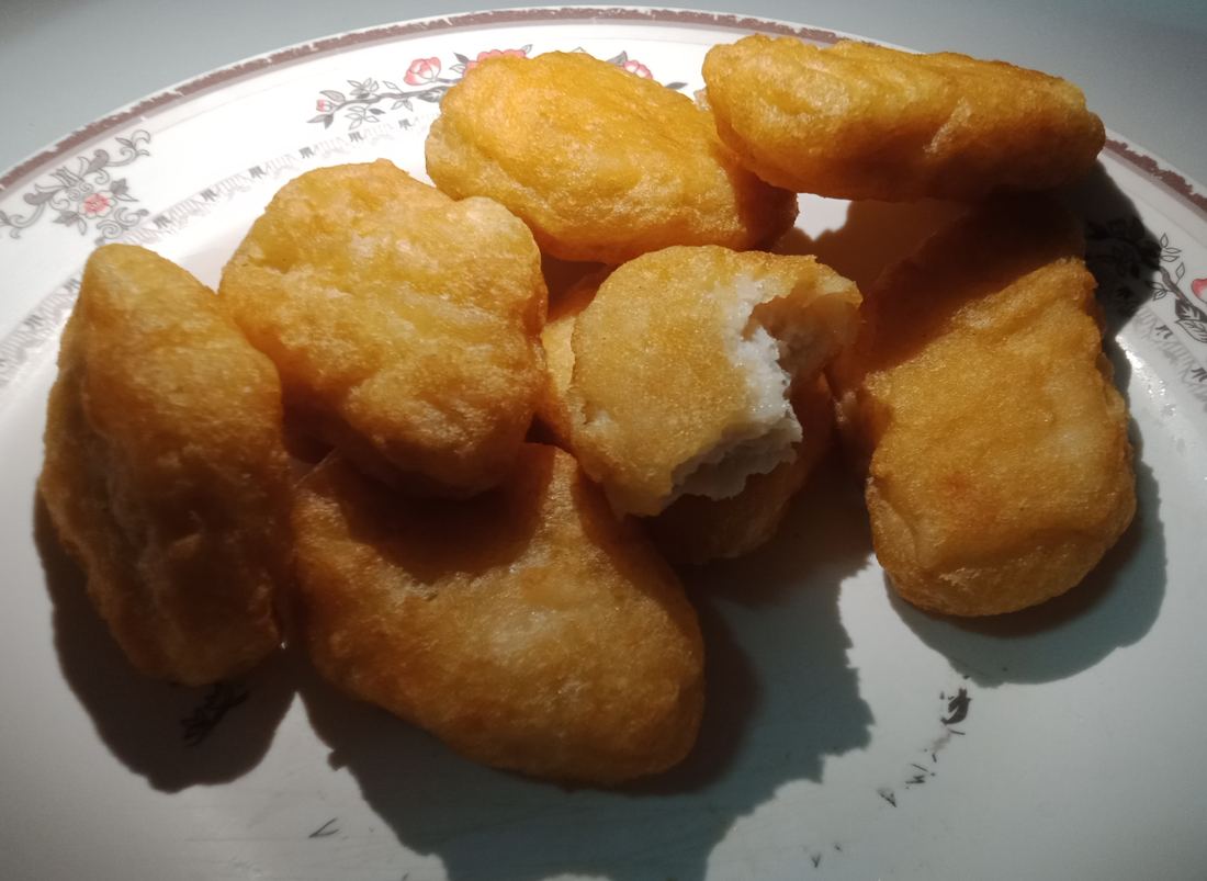 Chicken nuggets served on a plate