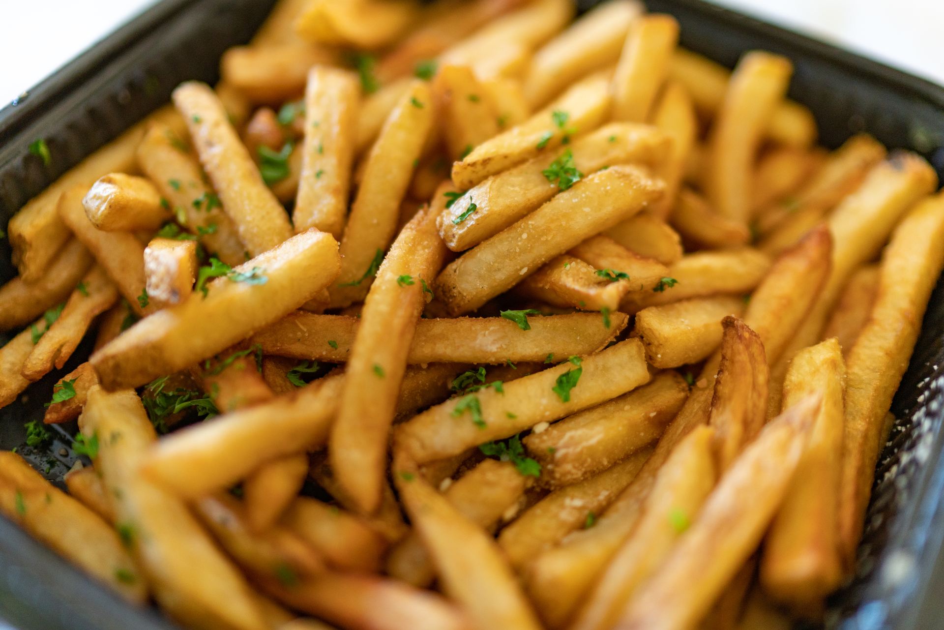 A basket of golden french fries