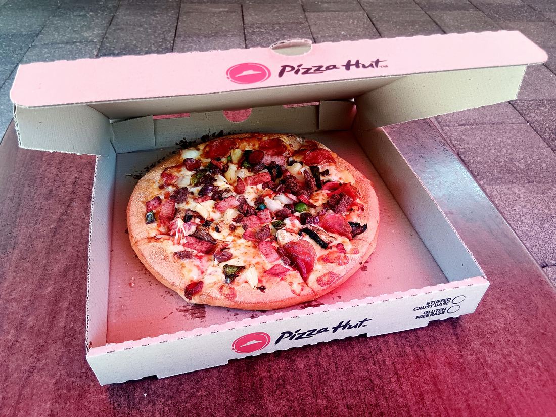 A loaded supreme pizza